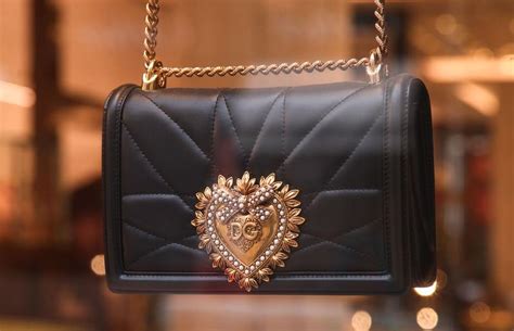 dolce and gabbana purse magnetic snaps fake|false dolce and gabbana purses.